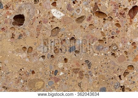 Surface Of A Conglomerate From The Alps In Southern Germany, So Called Nagelfluh