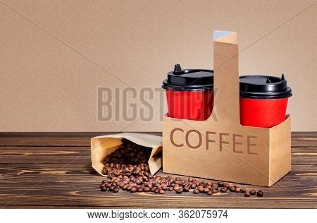 Red Coffee Cups In Card-box And Bag With Beans. Coffee To Go Concept.