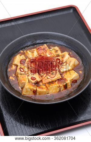 Chinese Cuisine Mabo Tofu In A Dish On Wooden Tray