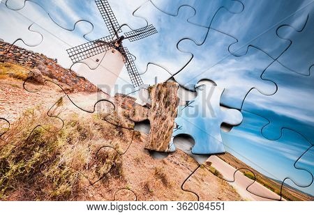 Puzzle made of beautiful landscape photo with windmill
