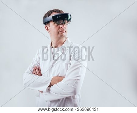 Doctor Uses Augmented Reality Goggles. Modern Technology.