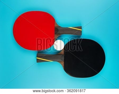 Set To Play Ping-pong On A Blue Background