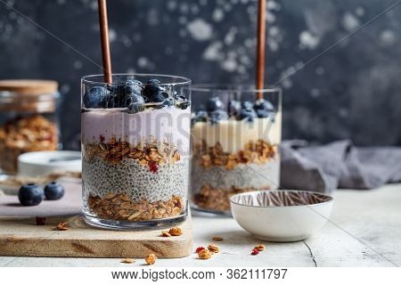 Breakfast Parfait With Chia, Granola, Berries And Yogurt In A Glass. Layer Dessert In A Glass.