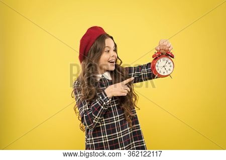 Girl With Alarm Clock. Set Up Alarm Clock. Child Little Girl Hold Red Clock. It Is Time. Always On T