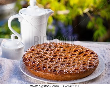 Cherry Pie With Dough Lattice From Limburg, Netherlands Served In Sunny Garden