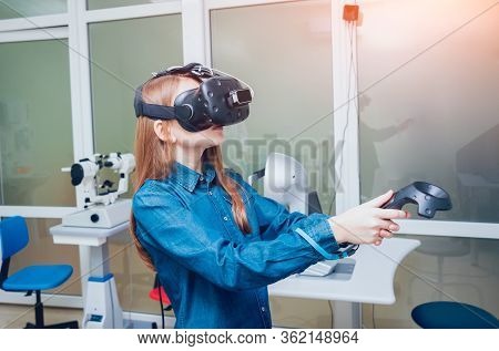 Eye Treatment. Patient In Virtual Reality Goggles.