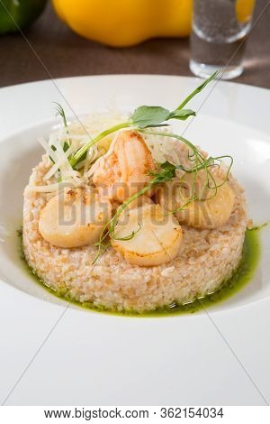 Scallops And Shrimps Served With Brown Rice