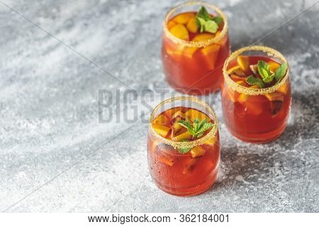 Three Glasses Of Campari Gin Spritz. Cocktail Of Sweet, A Touch Of Bitter From The Campari And Gorge