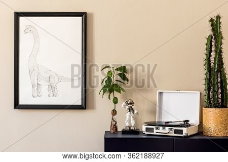 Stylish Interior Of Living Room With Black Mock Up Poster Frame, Plants, Blue Navy Commode, Decorati
