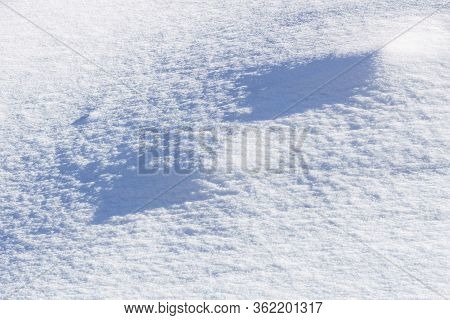 Abstract Clear White Snow In Sunny Day As A Background.