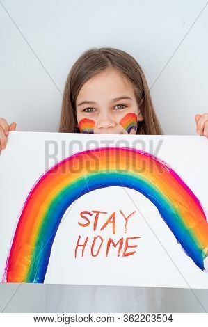 Girl With Blond Hair Drew A Rainbow And A Poster Stay Home. Flashmob Chasetherainbow.