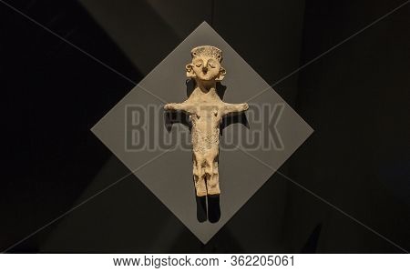 Barcelona, Spain - Dec 27th, 2019: Terracotta Statuette Of Carthaginian Goddess. 4th Century Bc, Pui