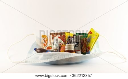 Toy Products And Necessities Of Different Brands With A Medical Mask
