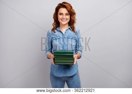 Portrait Of Positive Cheerful Woman High School Librarian Hold Pile Stack Books Prepare Exam Courses