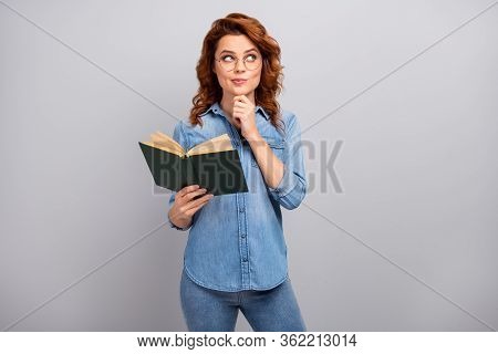 Portrait Of Minded Interested Woman Read Paper Book Think Thoughts Imagine Plot Story Look Copyspace