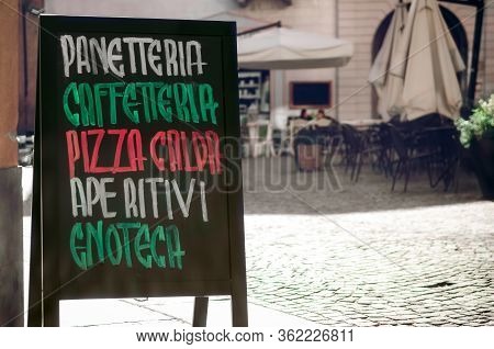 Italian Coffe Bar Signboard With The Words Panetteria (bakery), Caffetteria(cafeteria), Pizza Calda 