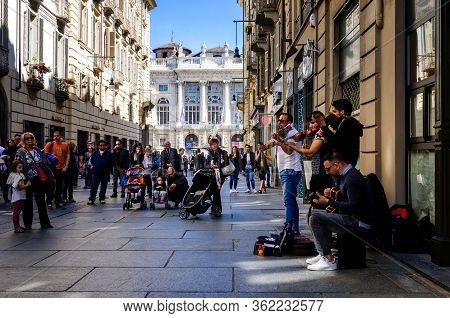 Turin, Italy - May 7, 2017: Street Band Playng Music In The Center Of Via Garibaldi, Main Shopping S