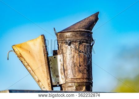 Old Bee Smoker. Tool Of The Beekeeper. Everything For A Beekeeper To Work With Bees.