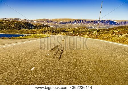 Road Crossing Hardangervidda Plateau, Norway Landscape. National Tourist Hardangervidda Route.