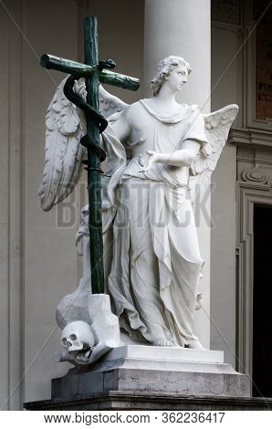 Detail Of The Old Testament Angel Sculpture At The Entrace Or The Karlskirche (saint Charles Church)