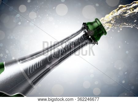 An Opening Bottle Of Champagne With The Words With Compliments And Liquid Pouring Out On A Glitsy Bo