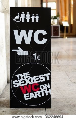 Lisbon, Portugal - February 3, 2019: Funny Black Signboard In The Streets Of Lisbon, Portugal, Point