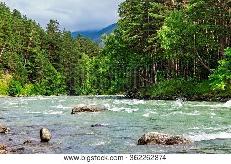 Bolshoy Zelenchuk River In The Caucasus Mountains On A Summer Day