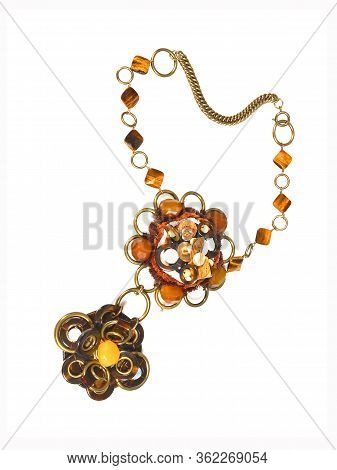 Women`s Necklace Of Yellow Gem Stones With Pendant On White 
Background. Top View