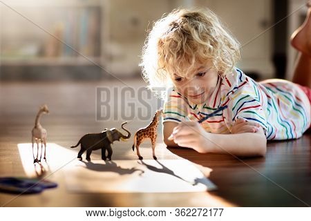 Child Shadow Drawing Animals. Kids Play At Home. Fun Crafts For Kindergarten Children. Little Boy Pa