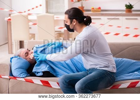Father and son in coronavirus disease concept at home