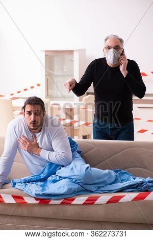 Father and son in coronavirus disease concept at home