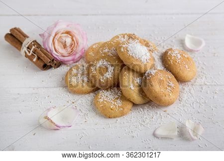 Homemade Coconut Cookies, Light Background And Pink Rose