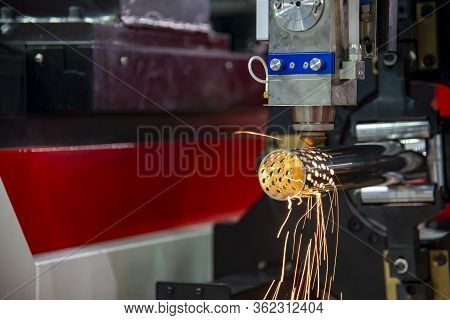 The Fiber Laser Cutting Machine Cutting The Stainless Steel Tube Control By Cnc Program. The Sheet M