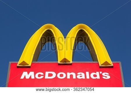 Skanderborg, Denmark - August 9, 2015: Mc Donalds Logo On A Pole. Mcdonalds Is The Worlds Largest Ch