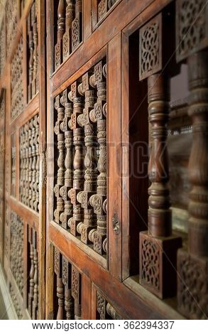 Angle View Of Interleaved Wooden Ornate Wall - Mashrabiya - At Abandoned Building