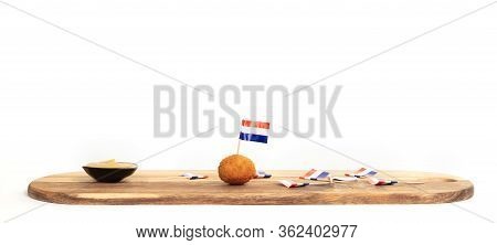 Dutch Traditional Snack Bitterbal, Just One Left On A Wooden Serving Board, Isolated