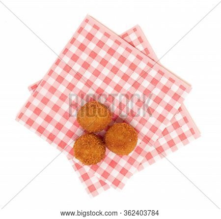 Dutch Traditional Snack Bitterbal On A Red And White Napkin, Isolated