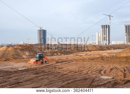 Vibration Single-cylinder Road Roller Leveling The Ground For The Foundation. Soil Compactor For Lay