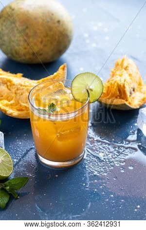 Exotic Fruit Juice From Bel Fruit Or Wooden Apple Called In India Bel Ka Sharbat. Cold Fruit Drink W