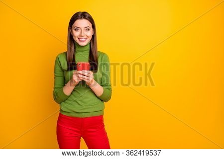 Portrait Of Cheerful Content Girl Use Smartphone Chatting With Friends Wear Casual Style Clothing Is
