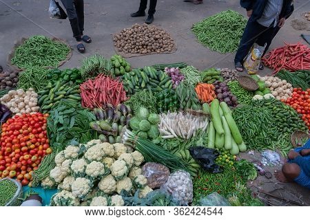 Kolkata, West Bengal, India - 16th December 2018 : Vegetables For Sale. Young Man Selling Them To Cu