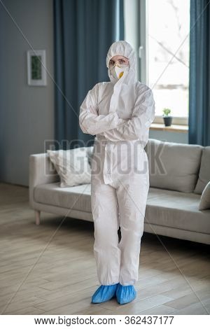 Woman In White Workwear And Protective Eyeglasses Looking Ready To Work