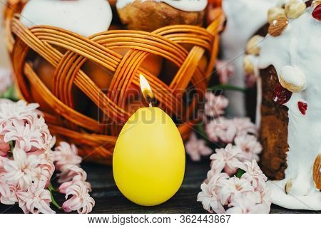 Easter Candle In Egg Form With Beautiful Frowers, Easter Bread And Easter Eggs