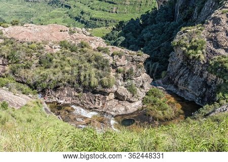Royal Natal National Park, South Africa - March 7, 2020: People Are Visible Next To The Gudu River A