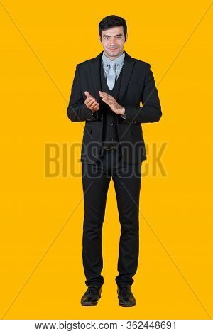 A Young Businessman In A Gray Shirt And Black Suit Is Clapping Hand And Starts A Successful Business