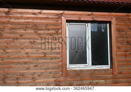 Plastic Window On Wood Background. Plastic Window In The House.