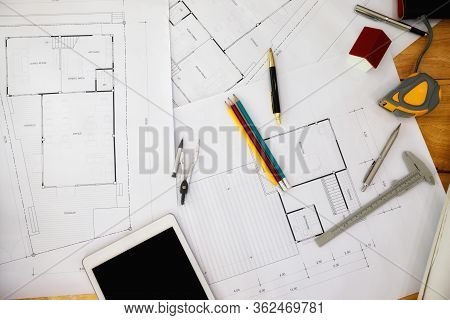 Construction Blueprints With Tools And Tablet, Top View. Tablet With Architectural Blueprints And Me