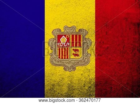 The Principality Of The Valley Of Andorra National Flag With Coat Of Arms. Grunge Background