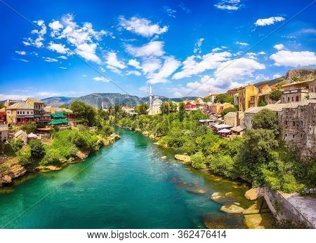 Nerteva River And Old City Of Mostar, With Ottoman Mosque  During Sunny Day. Location: Mostar, Old T