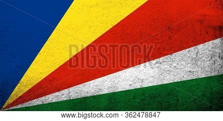 The Republic Of Seychelles National Flag. Grunge Background